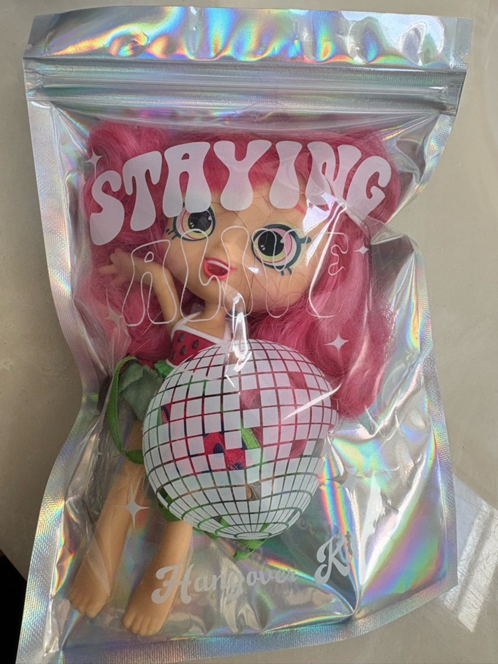 Pink-Haired Collectible Doll in Holographic Bag collectable pink strawberry